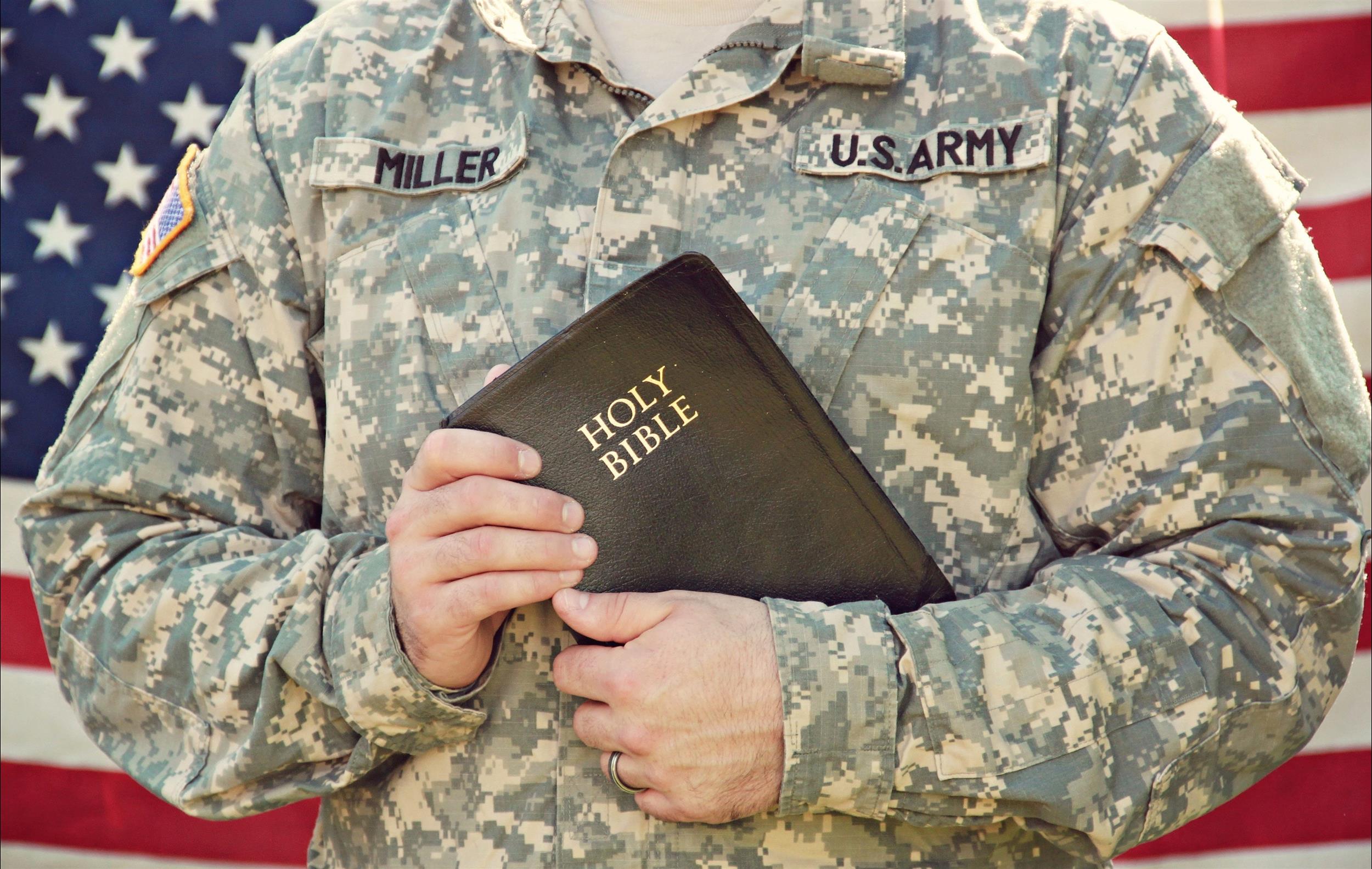 soldier-holding-bible.jpg